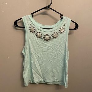 Light blue crop top with rhinestone detail